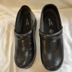 Nice Dansko size 41 black all leather clogs.
